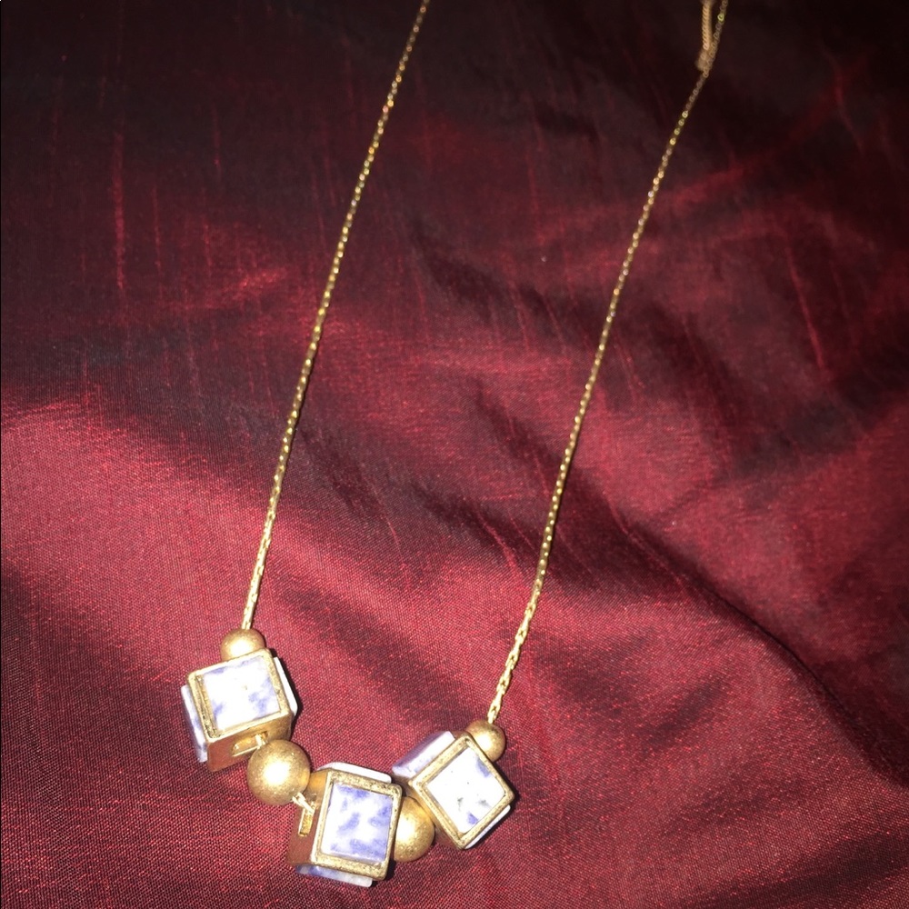 Gold chain with 3 Marbled cubes